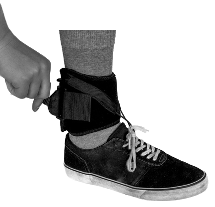 OrthoPed hook being removed from the shoe
