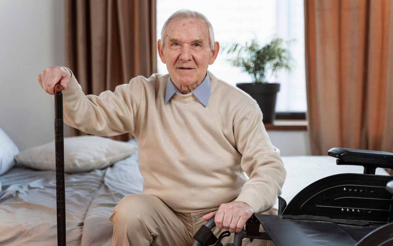 Older adult using a walking aid at home for safer mobility